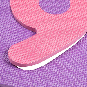 An image to show a number 9 shape being removed from the centre of a foam mat tile from the Large EVA Interlocking Foam Play Mat - Pack of 42
