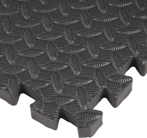 Close up of the non-slip surface of a black foam mat tile from the Extra Large Interlocking Black Foam Mat Tiles - Pack of 12